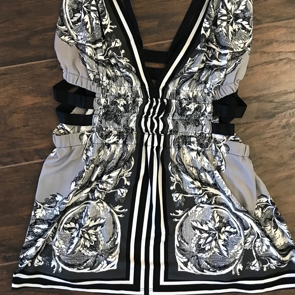 Black, grey and white tank with open sides